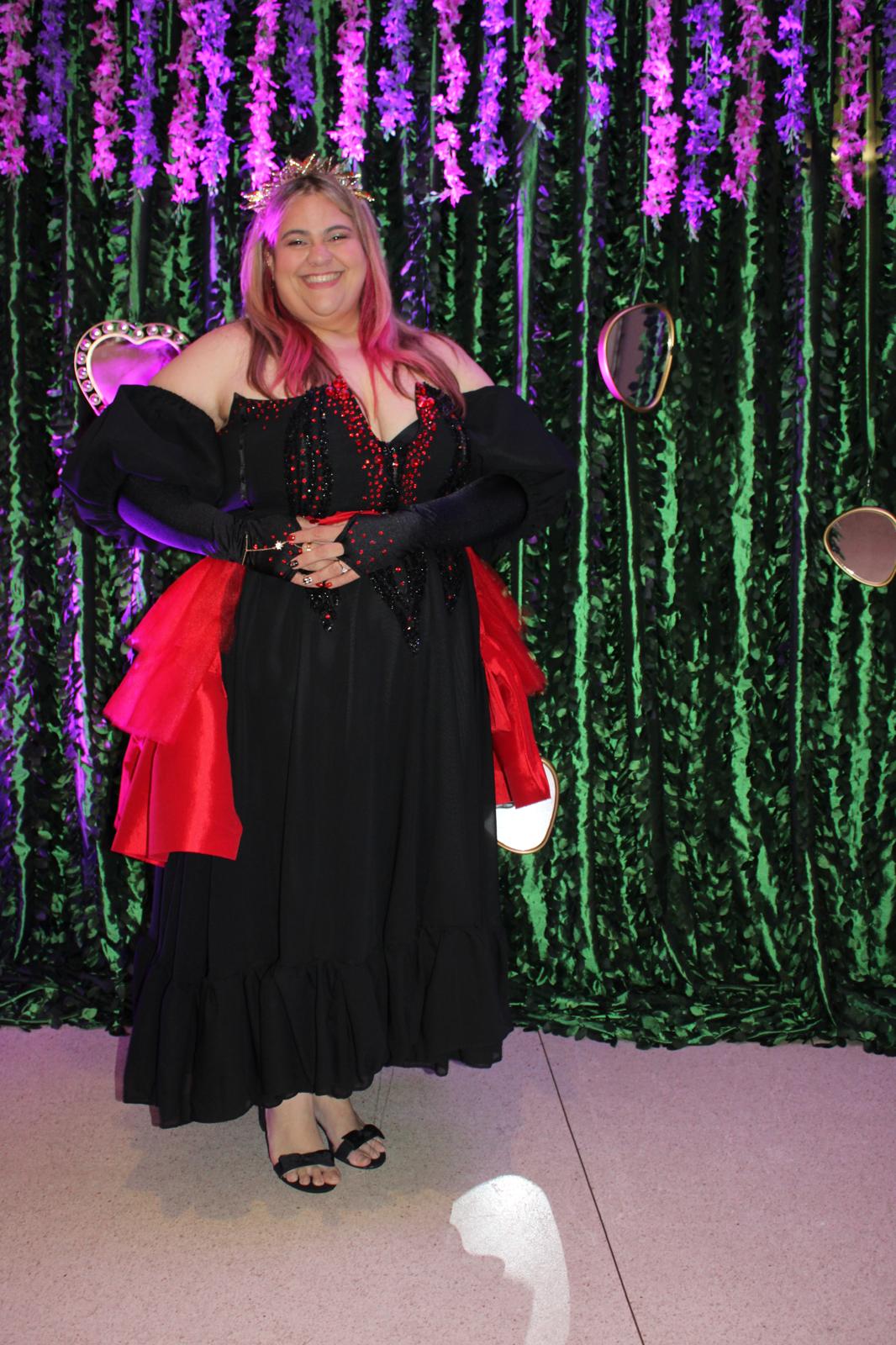 Chikielau reading in a cozy library setting